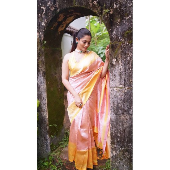 Mesmerizing Peach banarasi silver zari saree with contrast yellow blouse